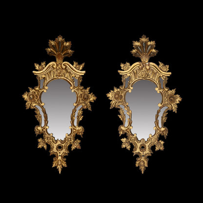 Pair of Spanish mirrors with golden wood frame.