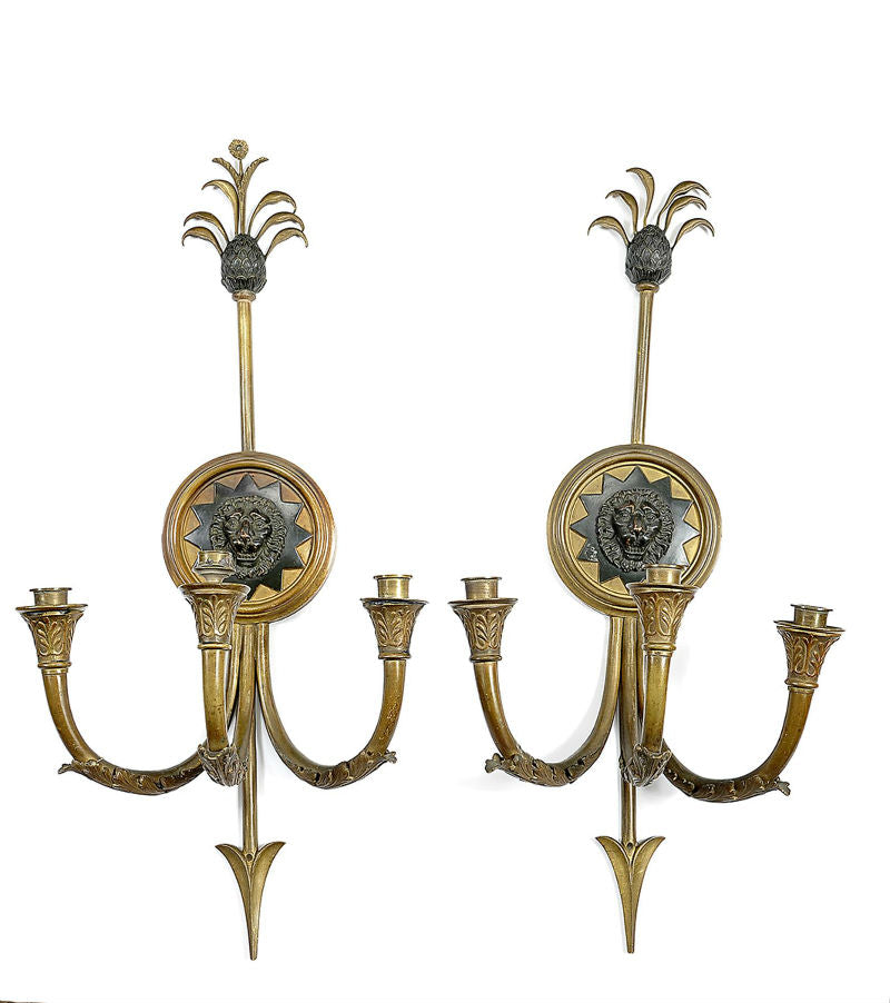 Pair of three-light wall sconces with “Grotesque masks”